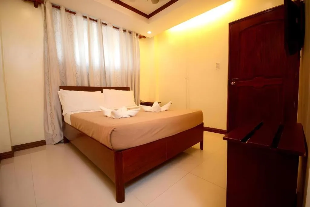 Bed in Ipil Suites El Nido