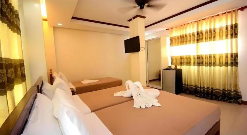 Bed in Ipil Suites El Nido