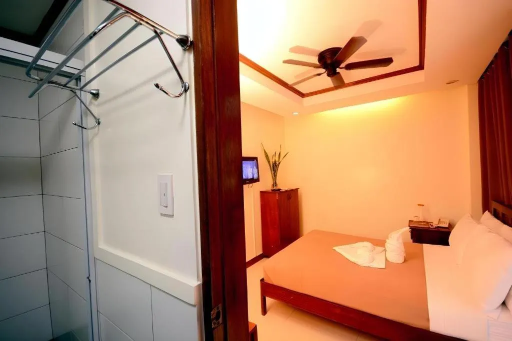 Bed in Ipil Suites El Nido