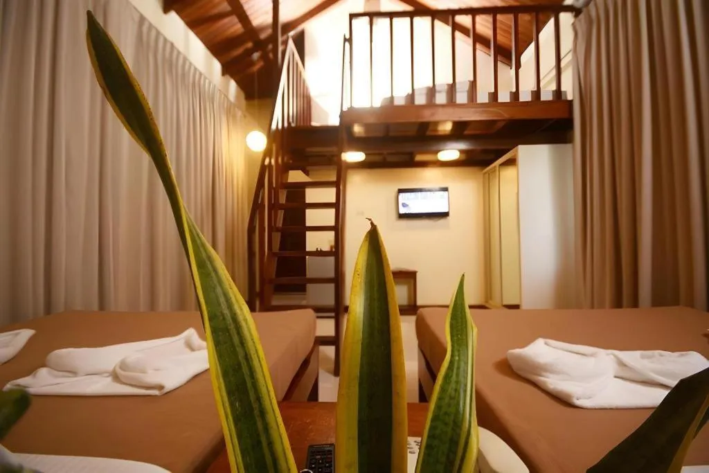 Bed in Ipil Suites El Nido