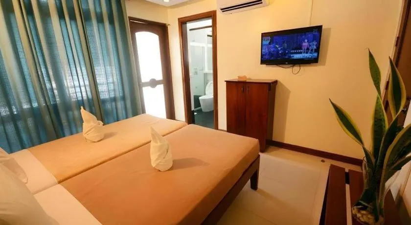 Bed in Ipil Suites El Nido