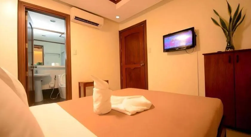 Bed in Ipil Suites El Nido