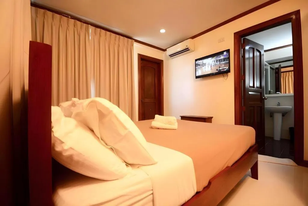 Bed in Ipil Suites El Nido