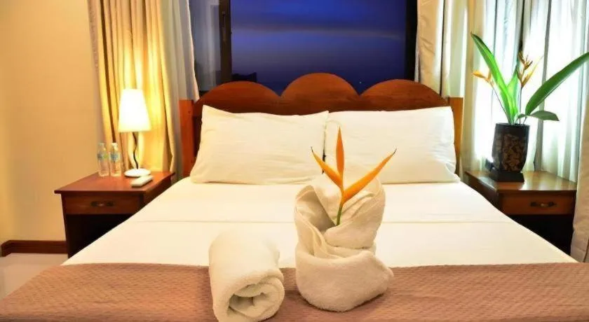 Bed in Ipil Suites El Nido