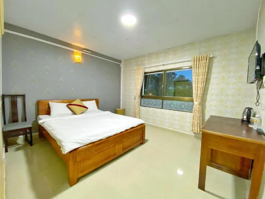 Bed in Gold Night Hotel