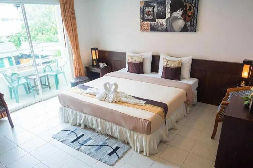 Bed in The Nice Patong Hotel