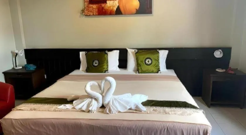 Bed in The Nice Patong Hotel