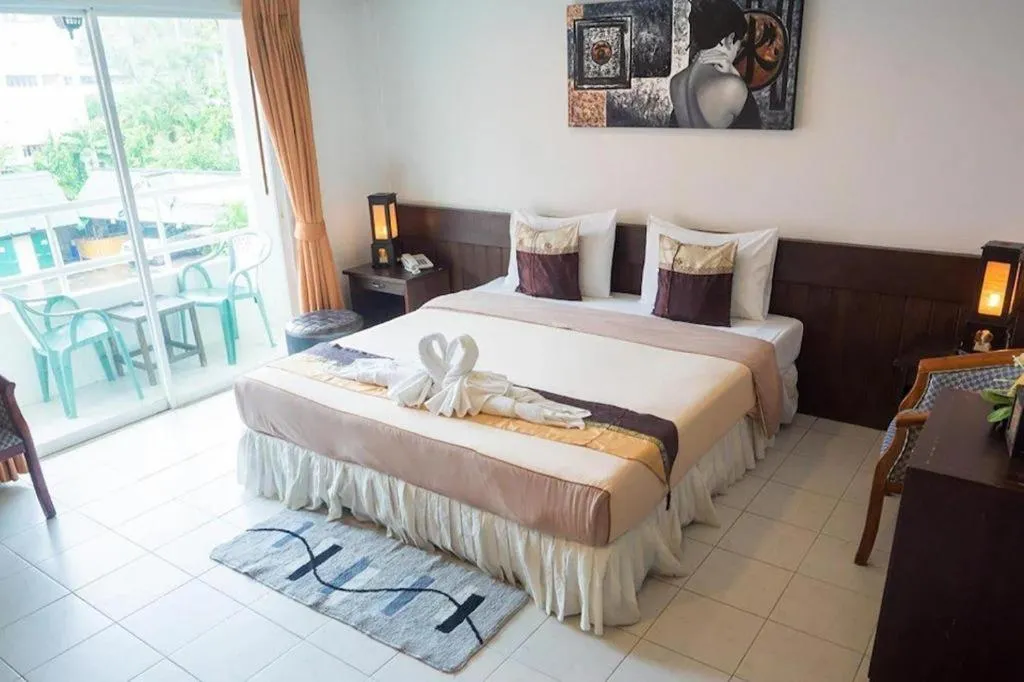 Bed in The Nice Patong Hotel