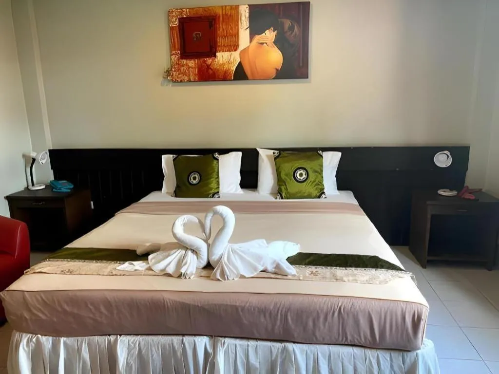 Bed in The Nice Patong Hotel