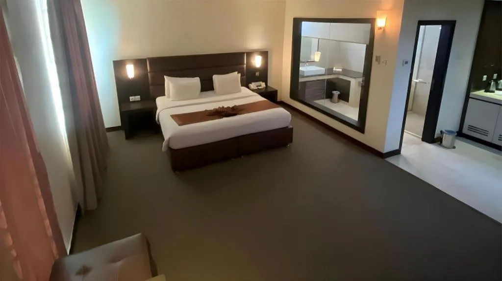 Bed in The BCC Hotel & Residence