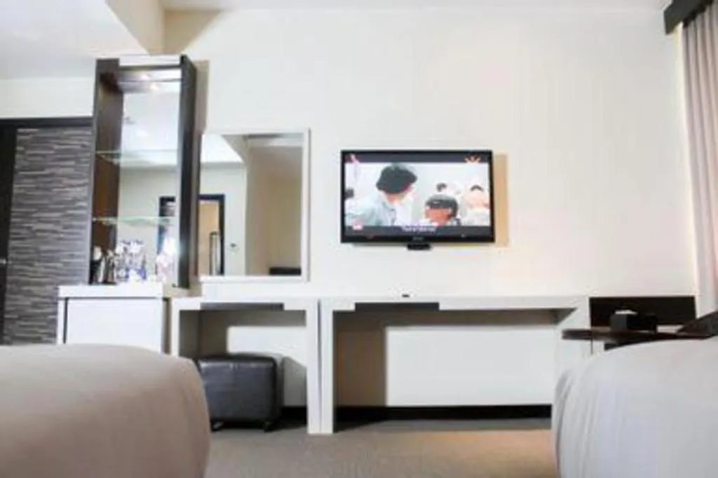 Bed in The BCC Hotel & Residence