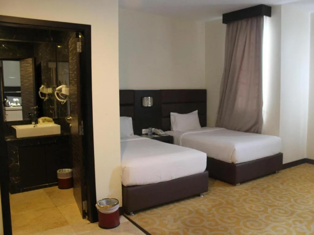 Bed in The BCC Hotel & Residence