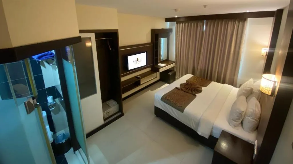 Bed in The BCC Hotel & Residence