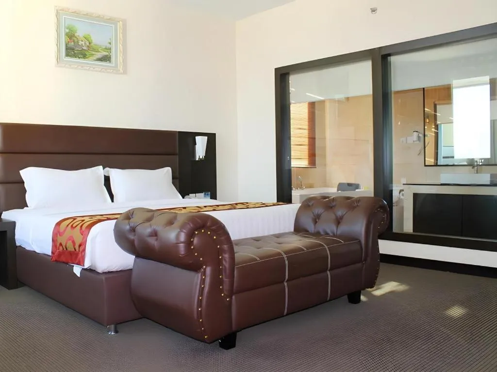 Bed in The BCC Hotel & Residence