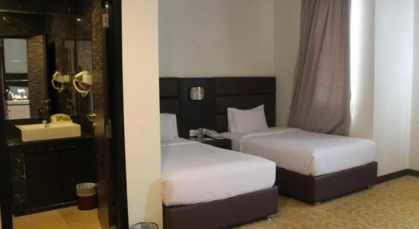 Bed in The BCC Hotel & Residence