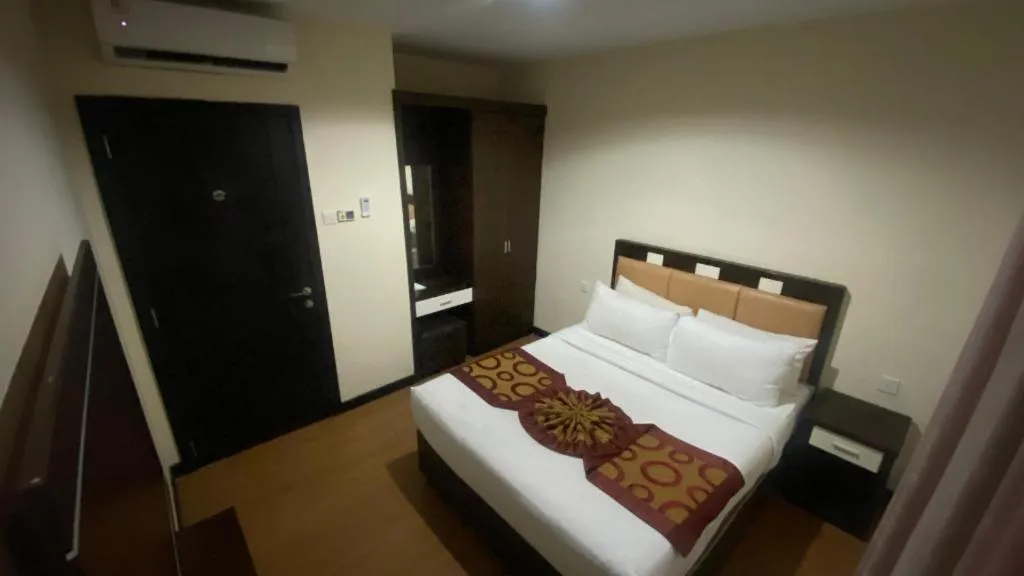 Bed in The BCC Hotel & Residence