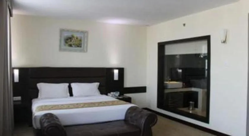 Bed in The BCC Hotel & Residence