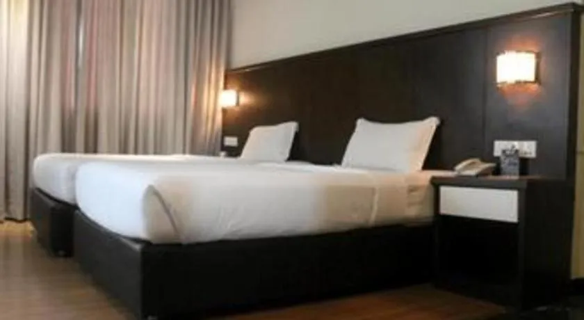 Bed in The BCC Hotel & Residence