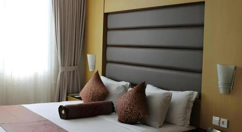 Bed in The BCC Hotel & Residence