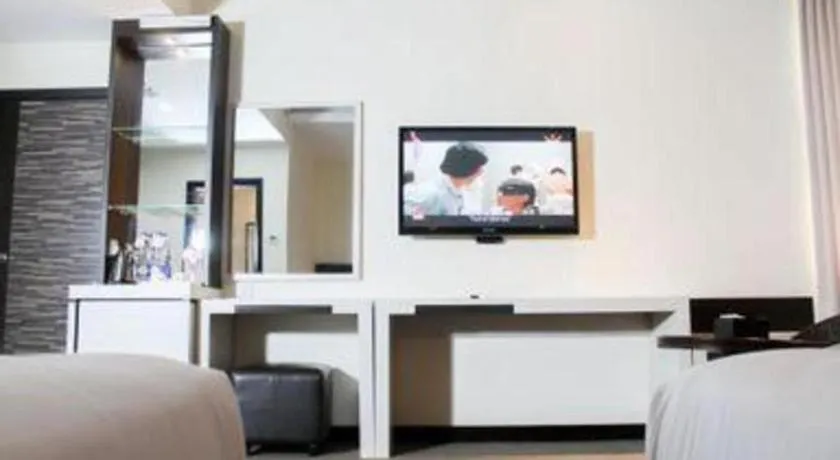 Bed in The BCC Hotel & Residence