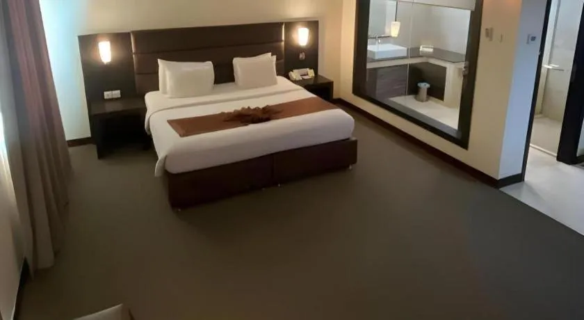 Bed in The BCC Hotel & Residence