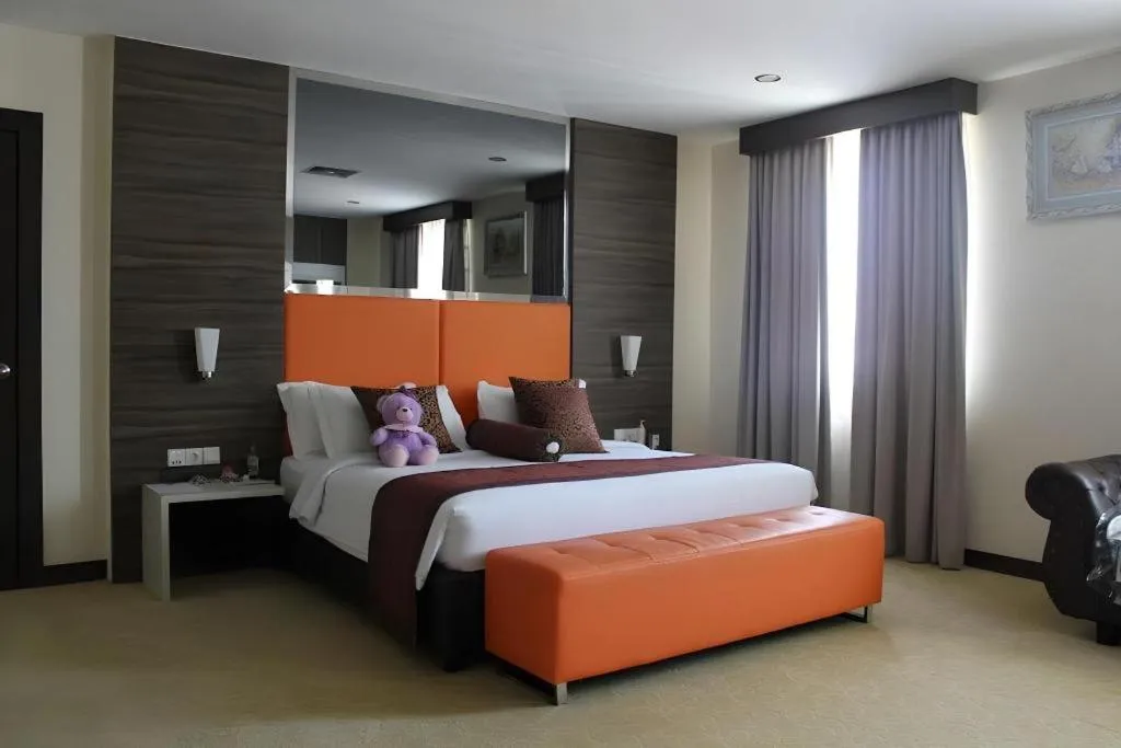 Bed in The BCC Hotel & Residence