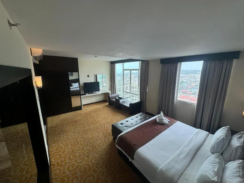 Bed in The BCC Hotel & Residence