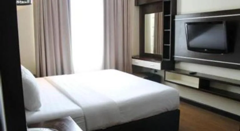 Bed in The BCC Hotel & Residence