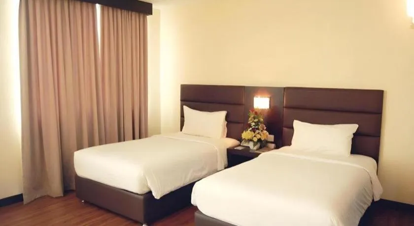 Bed in The BCC Hotel & Residence