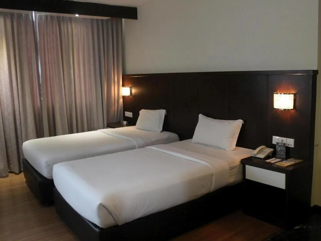 Bed in The BCC Hotel & Residence