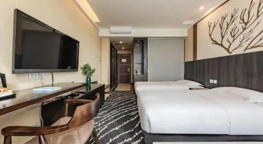 Bed in Kunming Long Way Hotel