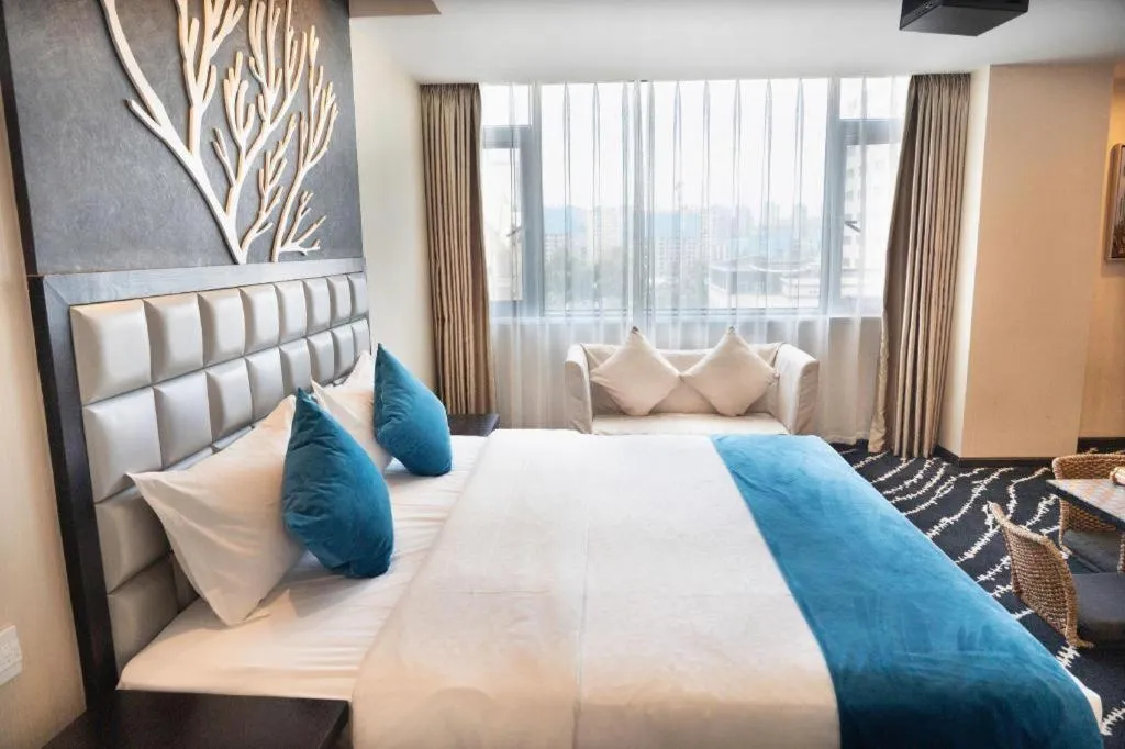 Bed in Kunming Long Way Hotel