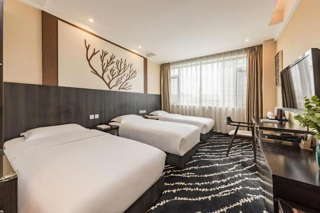 Bed in Kunming Long Way Hotel