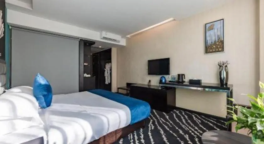 Bed in Kunming Long Way Hotel