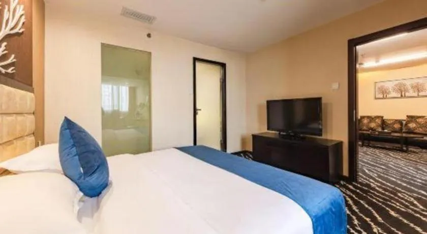 Bed in Kunming Long Way Hotel