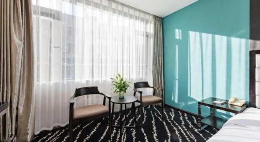 Bed in Kunming Long Way Hotel