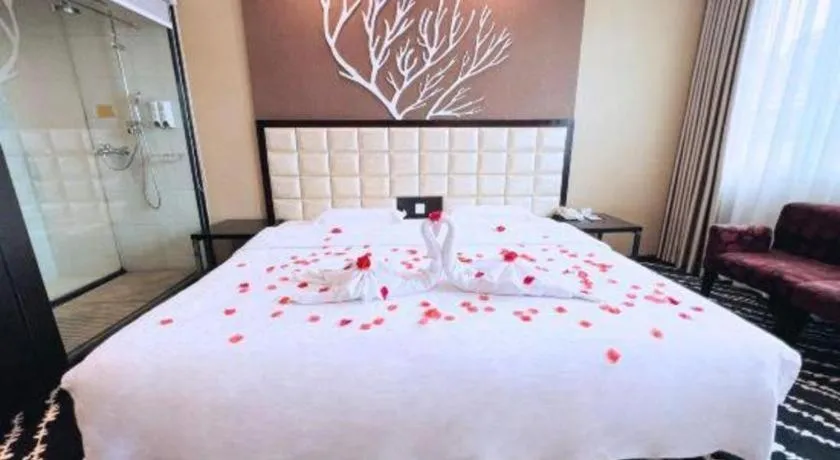 Bed in Kunming Long Way Hotel