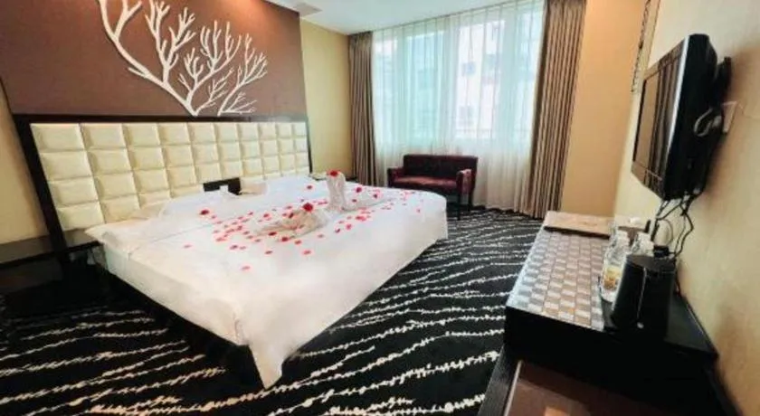 Bed in Kunming Long Way Hotel