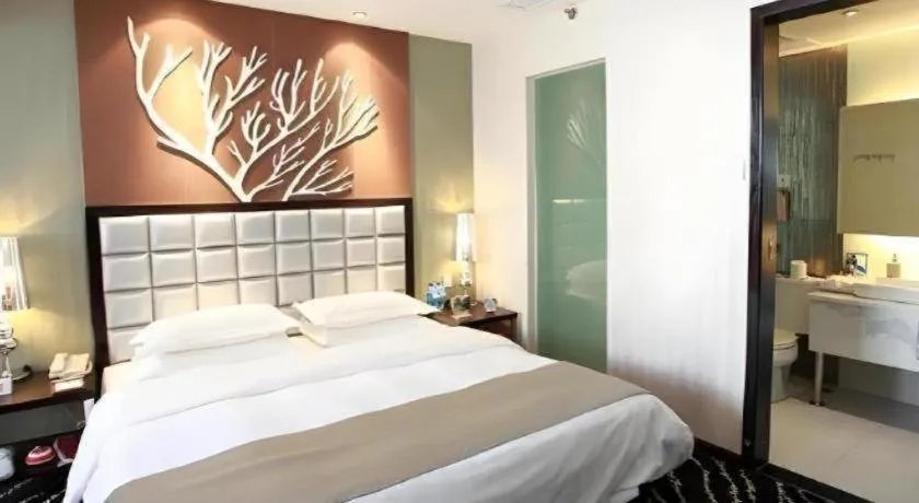 Bed in Kunming Long Way Hotel