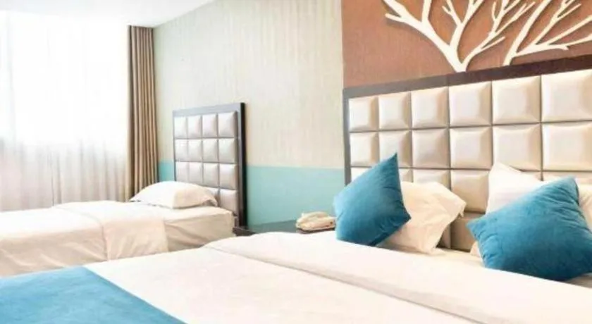 Bed in Kunming Long Way Hotel