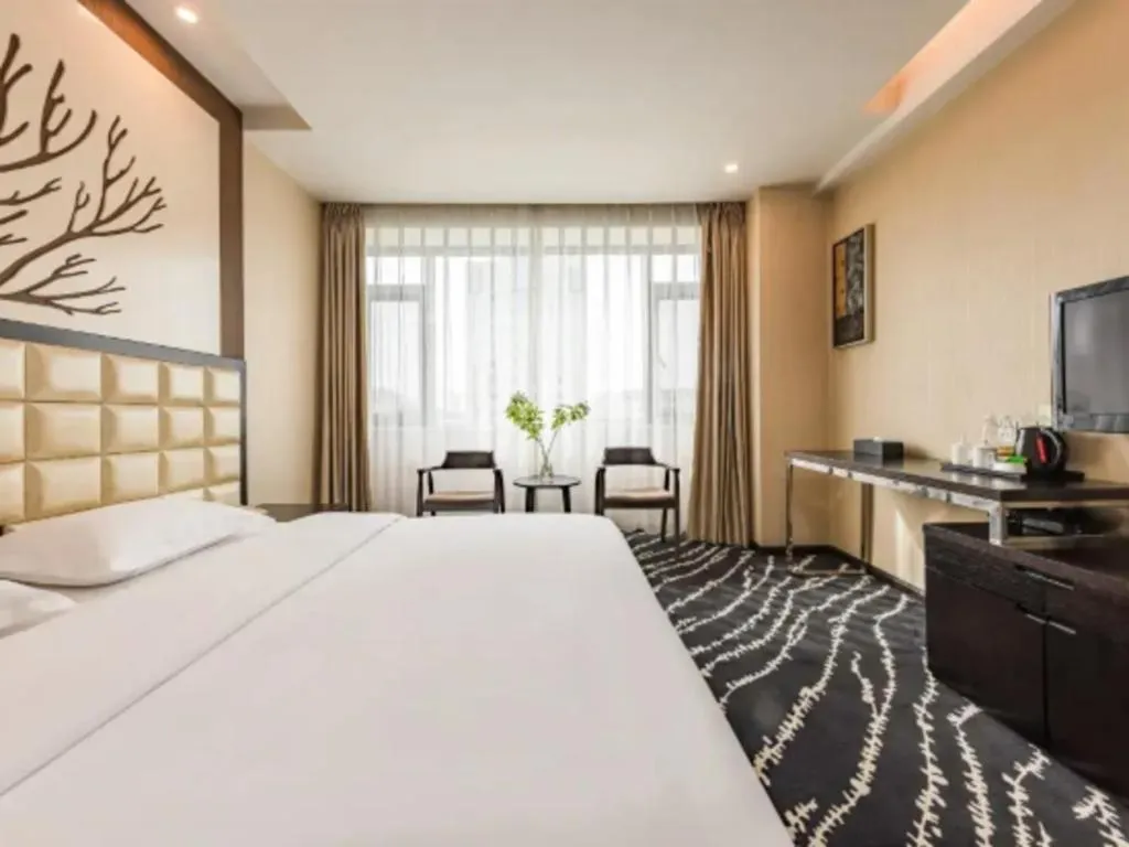 Bed in Kunming Long Way Hotel