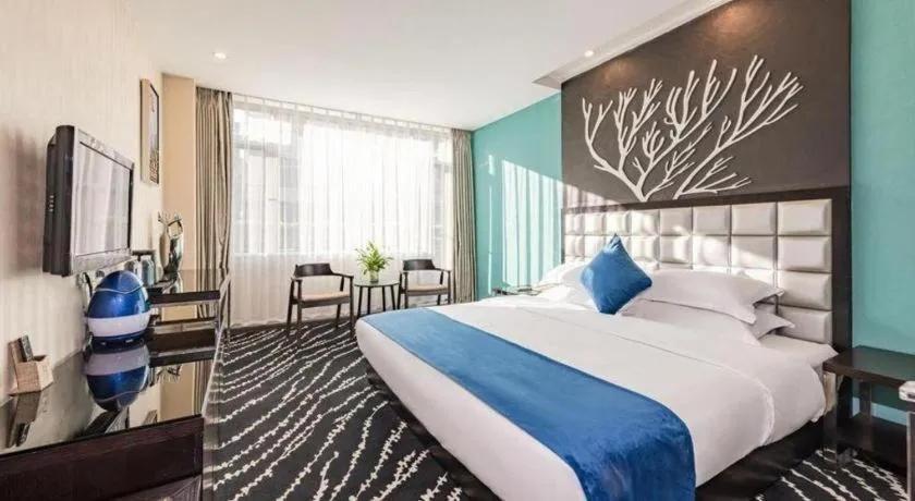 Bed in Kunming Long Way Hotel