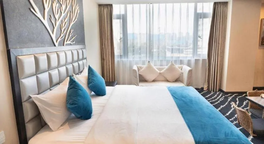 Bed in Kunming Long Way Hotel