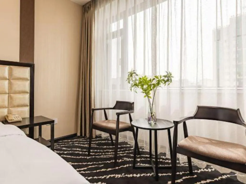 Bed in Kunming Long Way Hotel