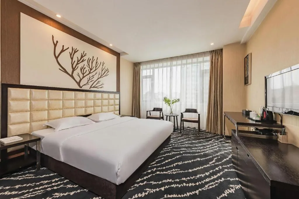 Bed in Kunming Long Way Hotel