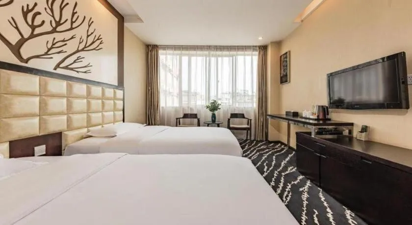 Bed in Kunming Long Way Hotel