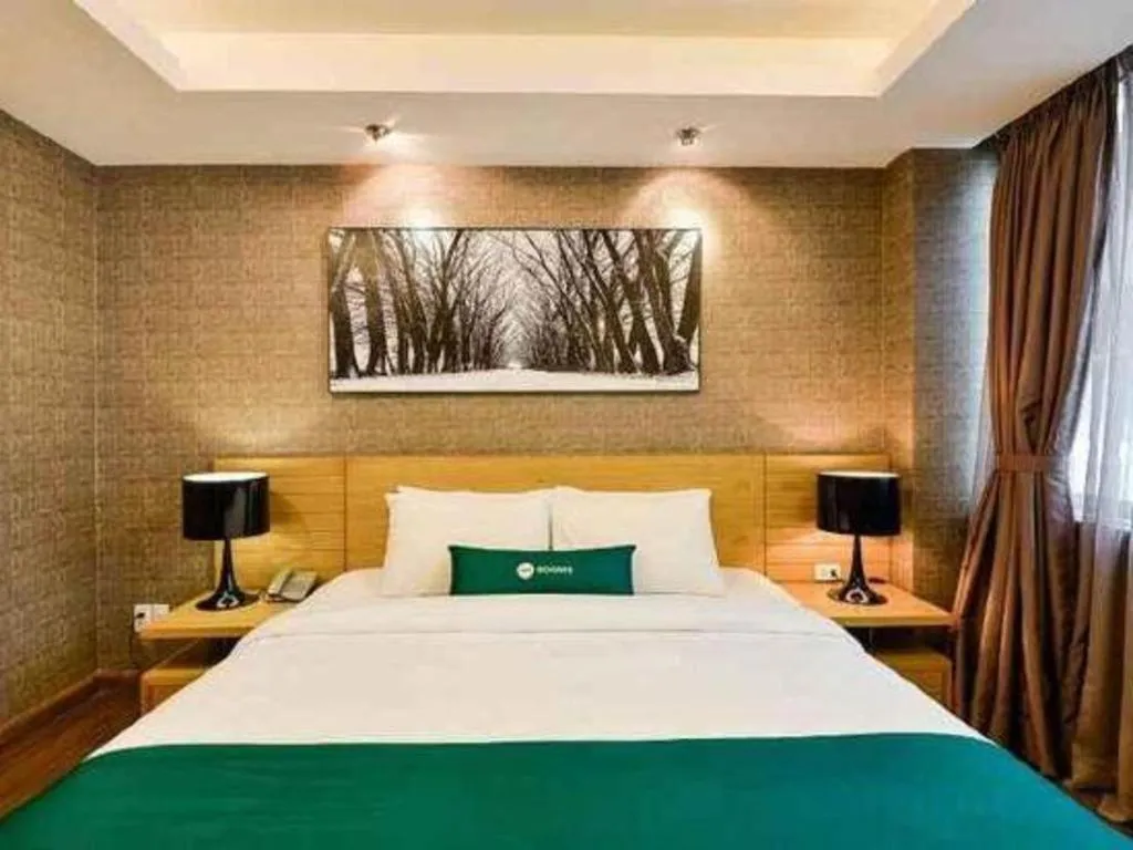 Bed in AHA Boutique Ben Thanh Hotel