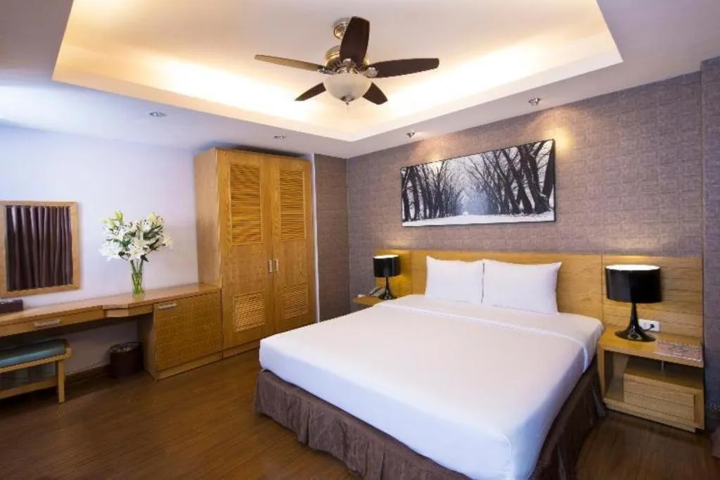 Bed in AHA Boutique Ben Thanh Hotel