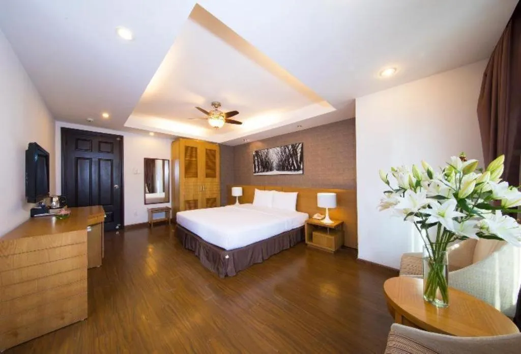 Bed in AHA Boutique Ben Thanh Hotel