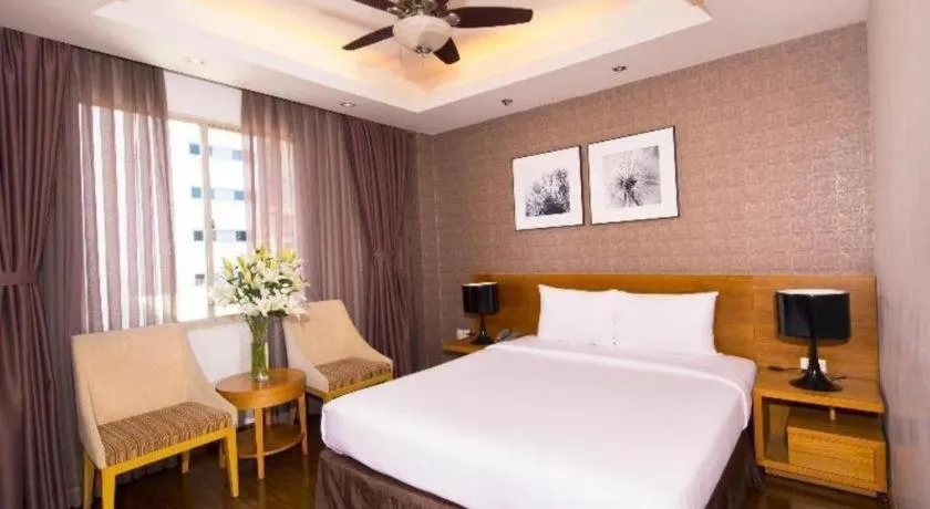 Bed in AHA Boutique Ben Thanh Hotel